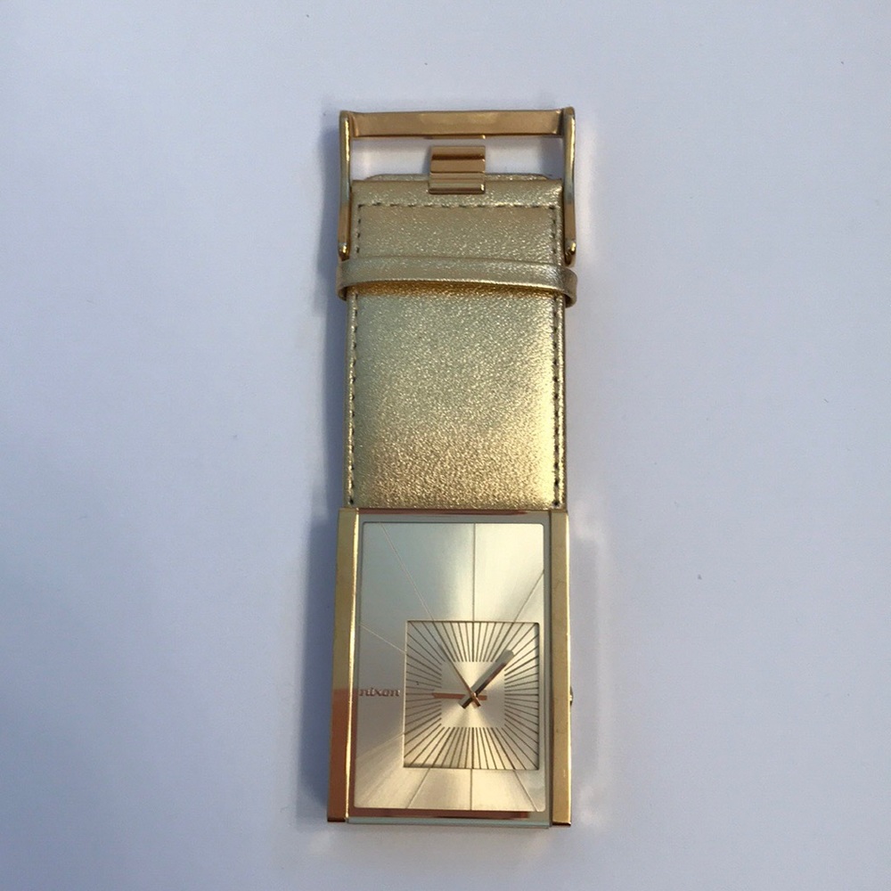 Nixon gold large gold face watch